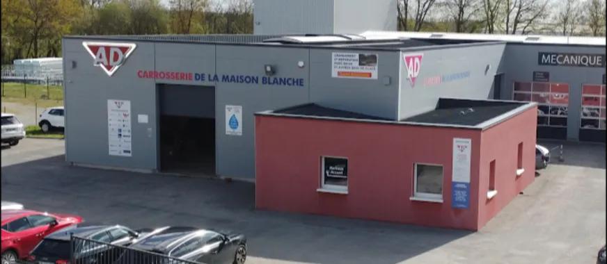 Photo de Garage carrosserie de la maison blanche